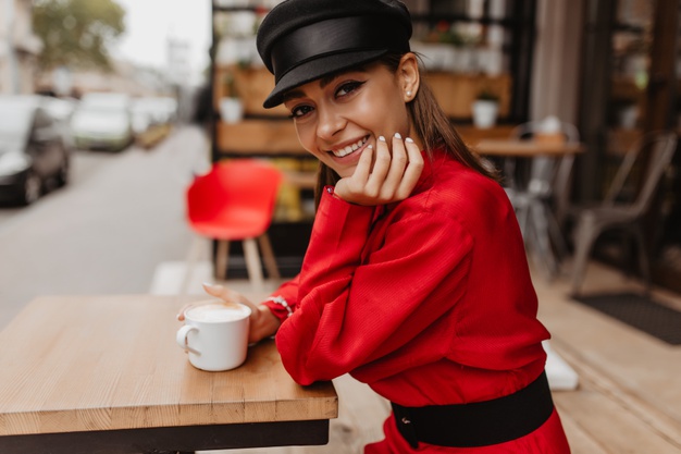lady-casual-outfit-posing-with-smile-street-portrait-happy-smiling-brunette-model-drinks-tea_197531-11995